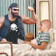 Blashock views Savage's muscles again.